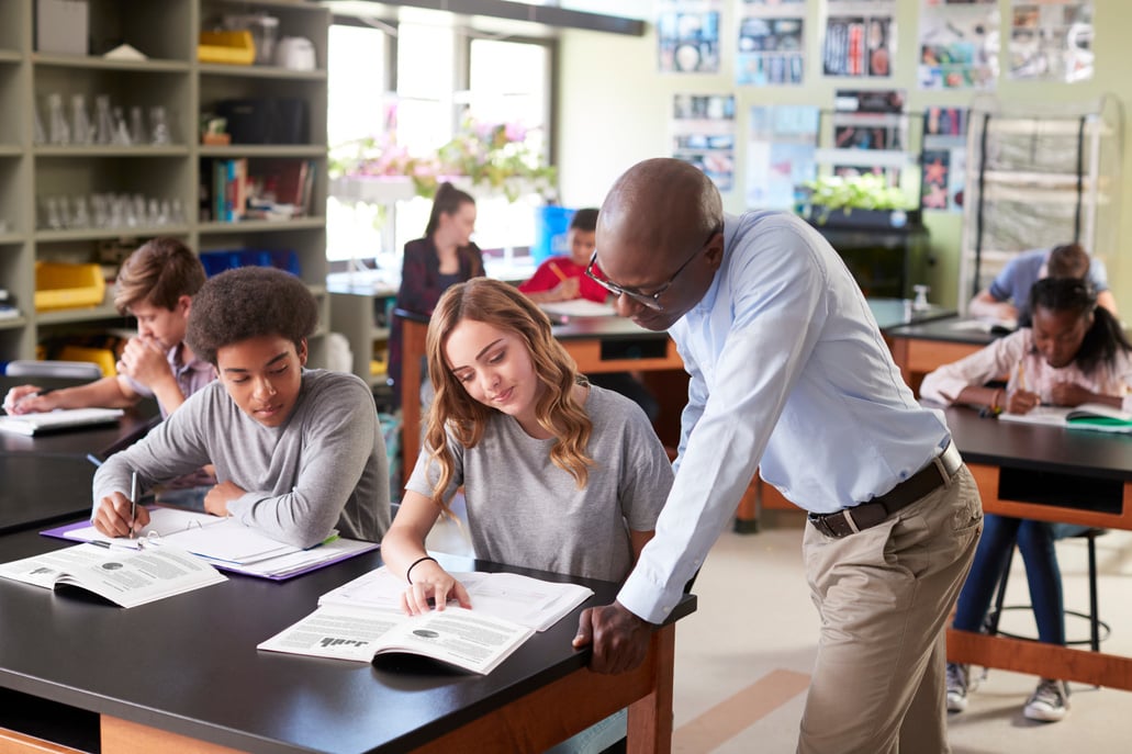 Teacher Guiding Students