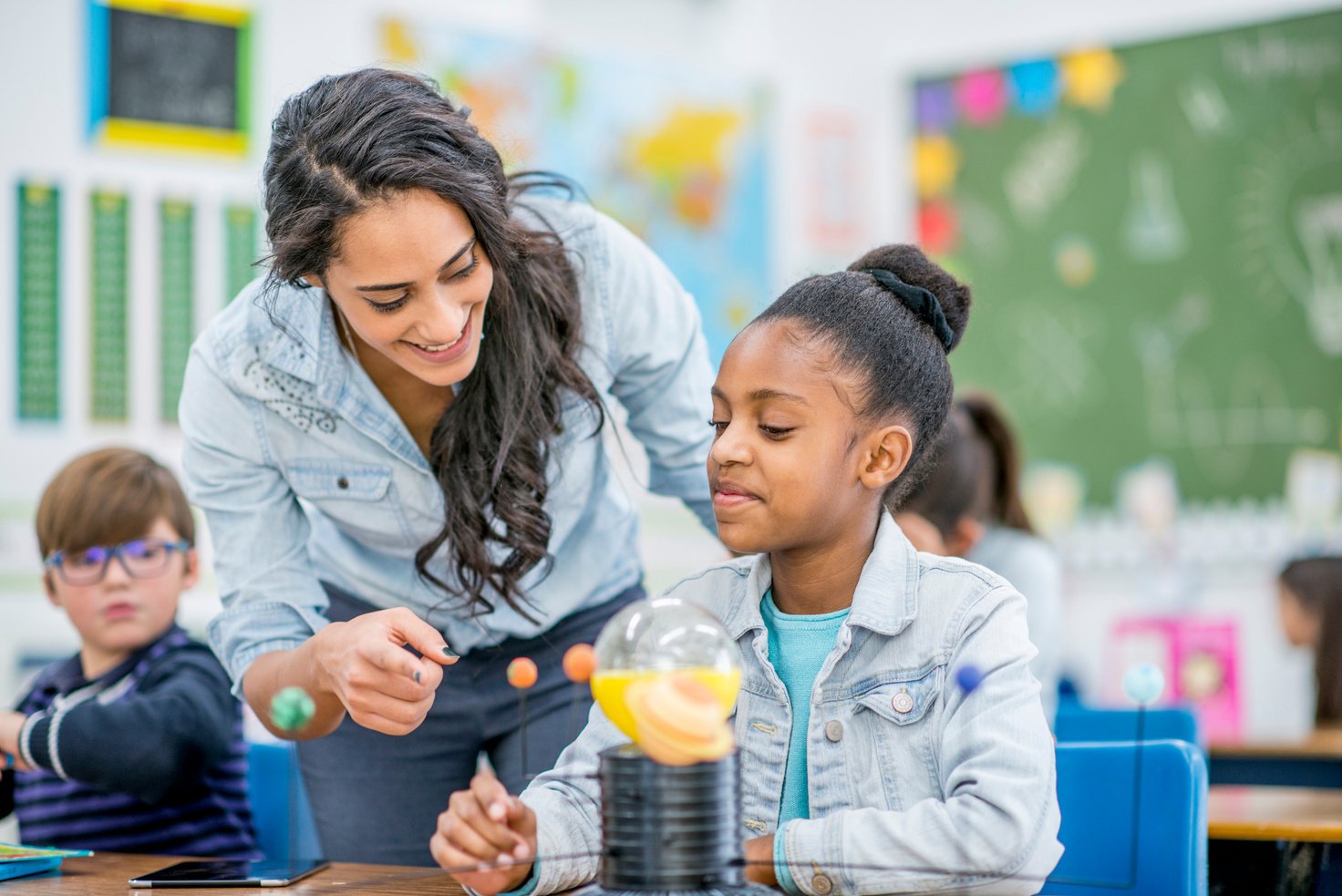 Teacher And Student Working Together